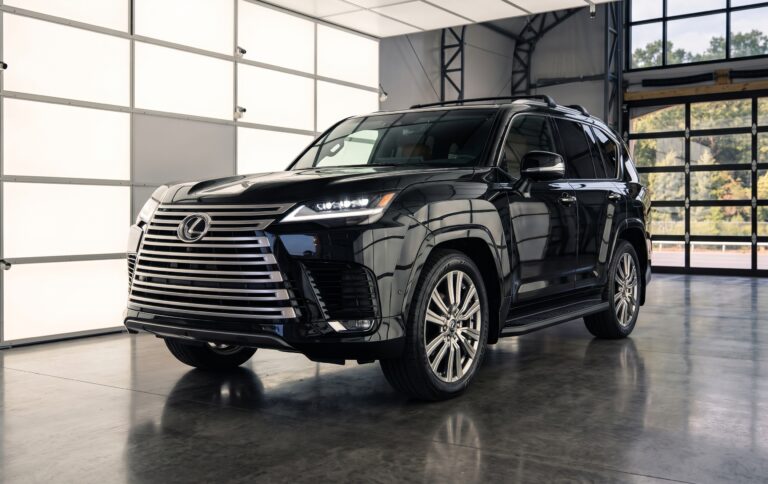 Black Lexus LX luxury SUV parked inside a modern vehicle showroom, featured for global export / import Lexus from USA services.